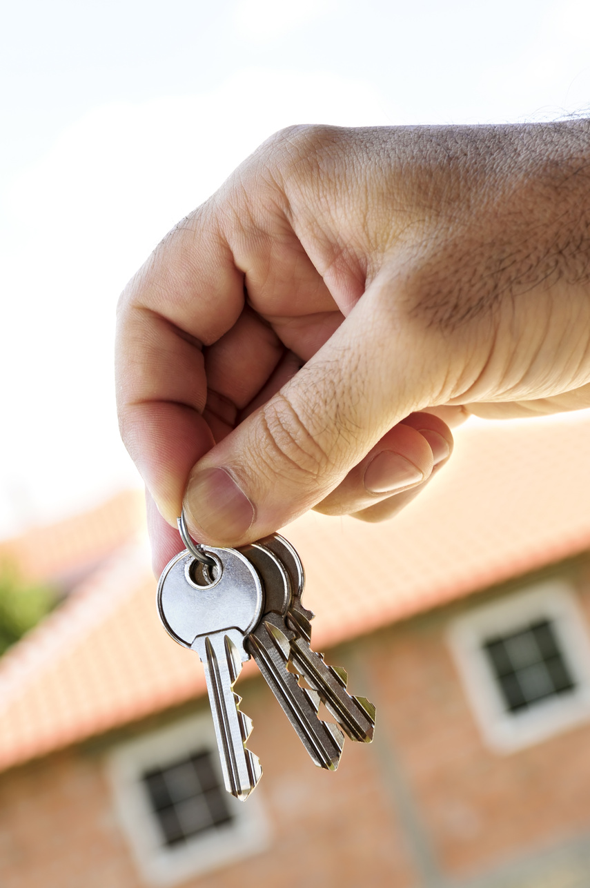 Hand Holding Keys
